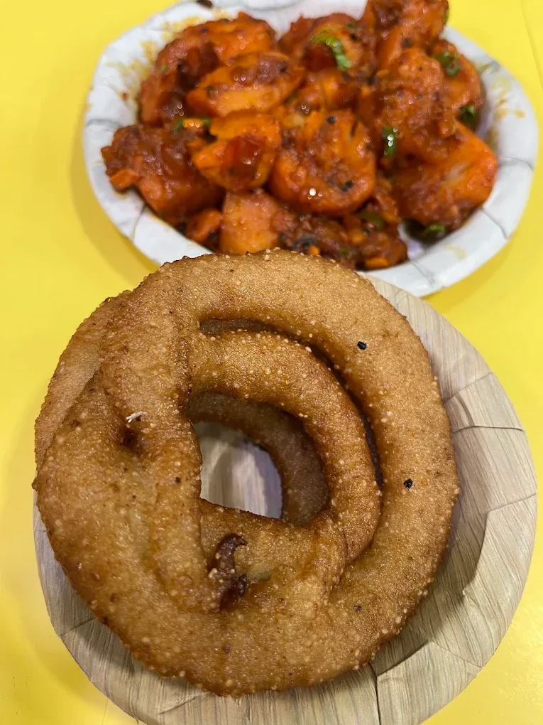 Aloo Dum with a ring of sel roti