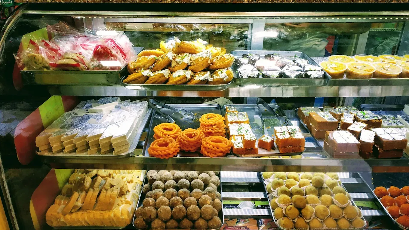 Trays of sweets in the counter display
